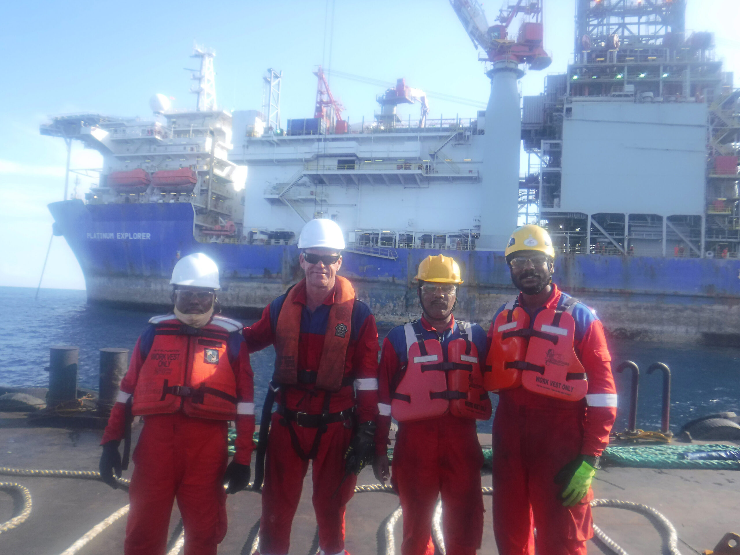 Axess’ engineers with Platinum Explorer in the background