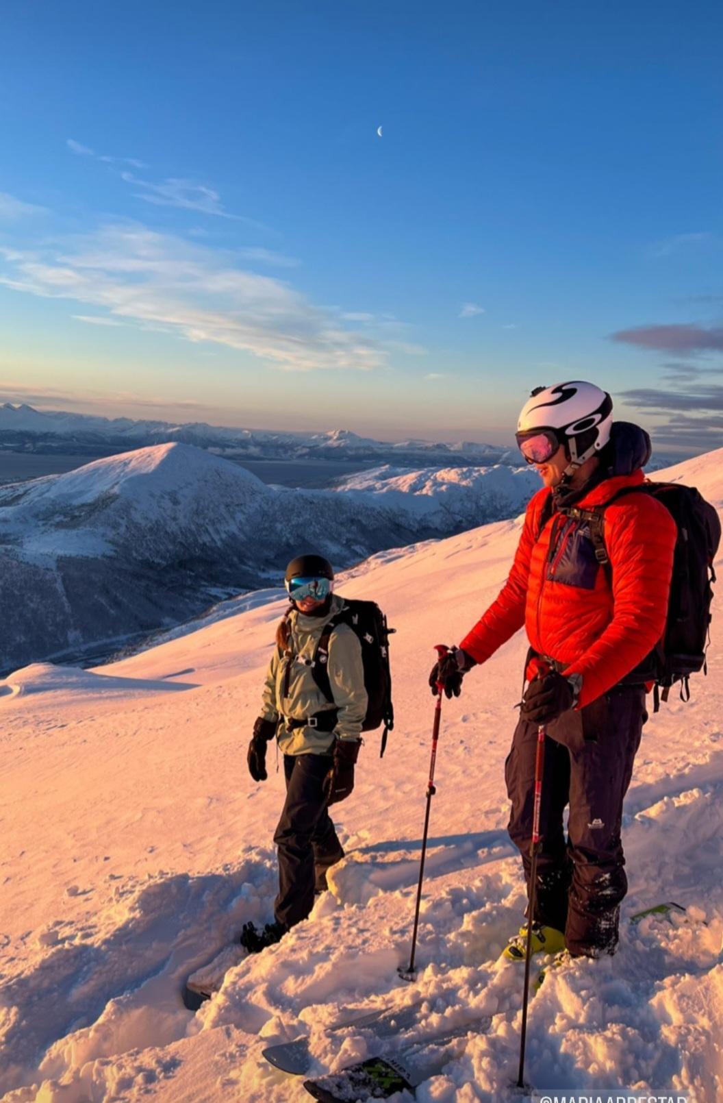 Mari (left) skiing with a colleague