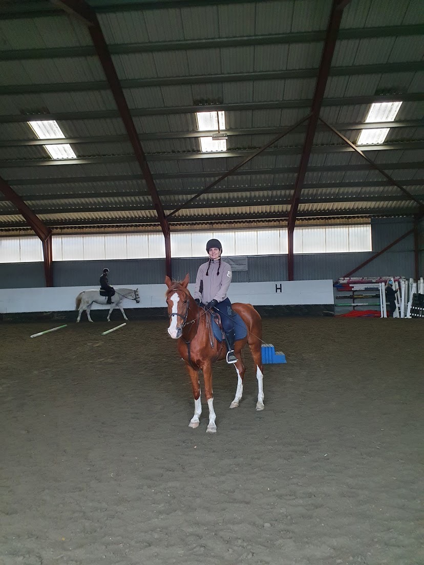 Sara on horseback