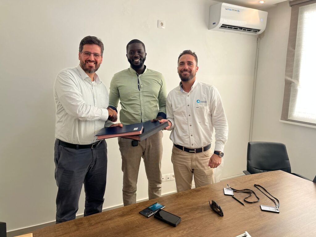 Matthew (right) with Fernando Siqueira, Senegal Country Manager at MODEC (left), Jules Y. Diop, Co-Founder and President of Gainde Marine Offshore (center) during the contract signing